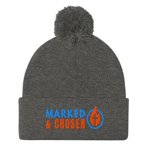 Dark Heather Grey Sportsman SP15 pom pom cuffed knit cap with Marked & Chosen Logo Embroidered on a white background.