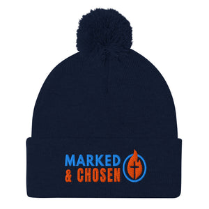 Navy Blue Sportsman SP15 pom pom cuffed knit cap with Marked & Chosen Logo Embroidered on a white background.