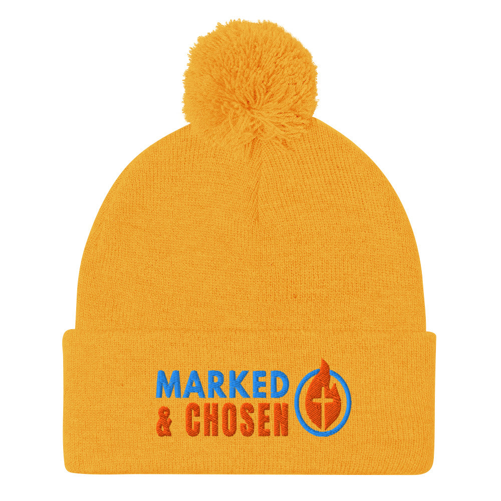 Gold Sportsman SP15 pom pom cuffed knit cap with Marked & Chosen Logo Embroidered on a white background.