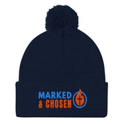 Navy Blue Sportsman SP15 pom pom cuffed knit cap with Marked & Chosen Logo Embroidered on a white background.