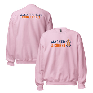 Gildan 18000 heavy blend crewneck sweatshirt, 50/50 blend in Light Pink color, featuring a soft interior and double-needle stitching and printed with the Marked & Chosen Logo on the front. On the back Galatians 6:17 and Romans 12:2.