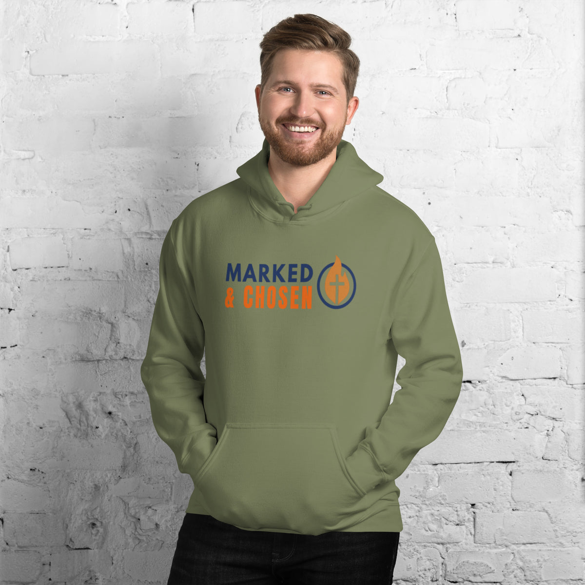 Model wearing Gildan 18500 heavy blend hooded sweatshirt in Military Green, showing a classic fit and Printed on the front is the Marked & Chosen Logo.
